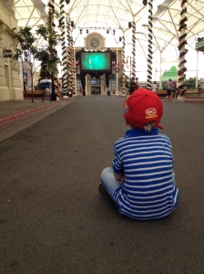 What ould you do if you were the first kid into Movie World for the day, and no rides were open? Find a spot to watch TV was Callum's solution.